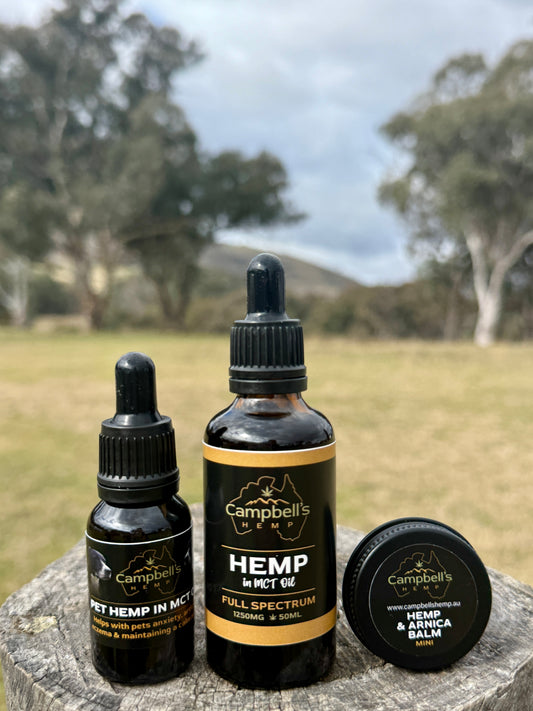 Campbell's Hemp products including bottles and a balm on a stone surface with a natural background.

Campbell's Hemp Trial Pack – mini wellness bundle with hemp oil, pet hemp oil, and balm for natural pain relief, skin care, and pet support