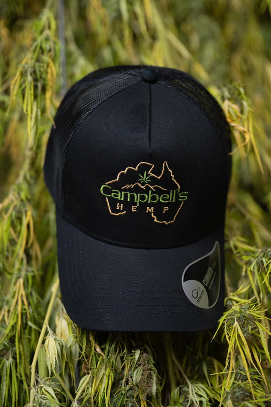 Black cap with 'Campbell's Hemp' logo on a cannabis plant background.